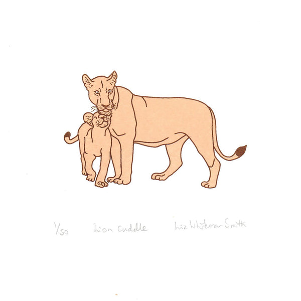 A print of a lion cub and its mother