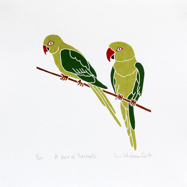 A print of two birds perched on a branch