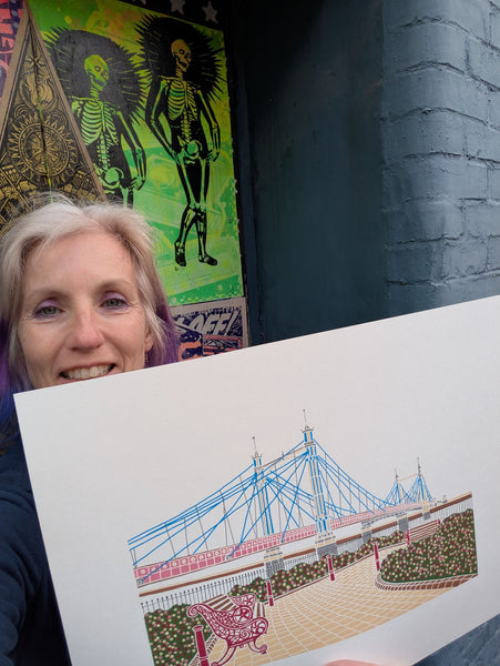 Print of Albert Bridge with Battersea Park in the foreground held by Liz