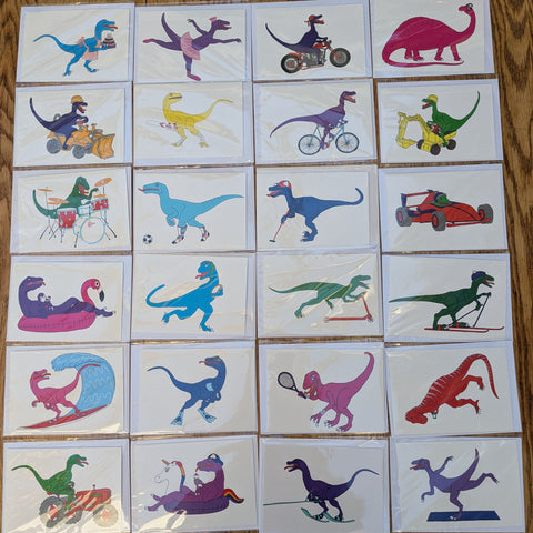 Set of colorful dinosaur illustrations on a white background
