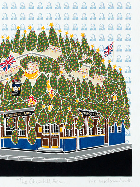 Print of the Churchill Arms pub in London with Christmas trees and British flags