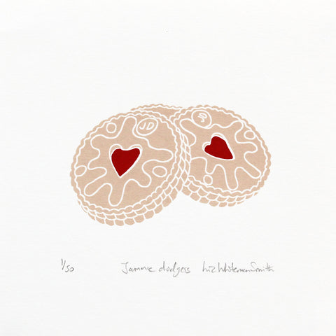 Two round cookies with red hearts in the center on a white background.