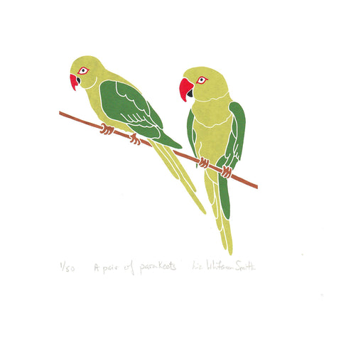 A print of two birds perched on a branch