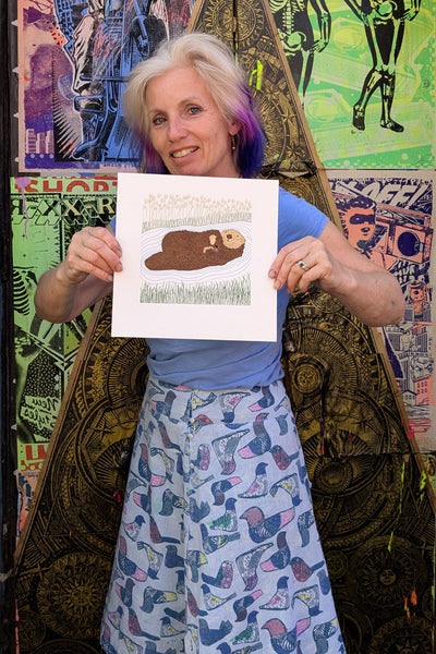 Print of otter mother and pup held by Liz