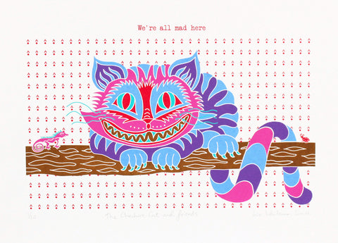 A print of the Cheshire cat with a lizard and a ladybird