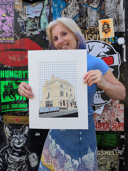 Print of the Warrington Hotel pub in Maida Vale held by Liz