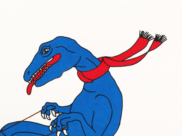 Blue velociraptor with a red scarf tobogganing