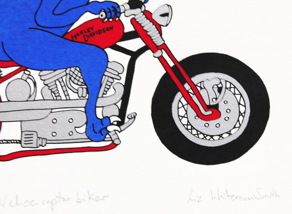 Blue velociraptor riding a red Harley Davidson wearing a red spotted bandana print