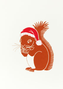 Squirrel wearing a red Christmas card