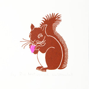 Brown squirrel clutching a pink heart