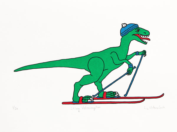 Green velociraptor on red skis with a blue bobble hat
